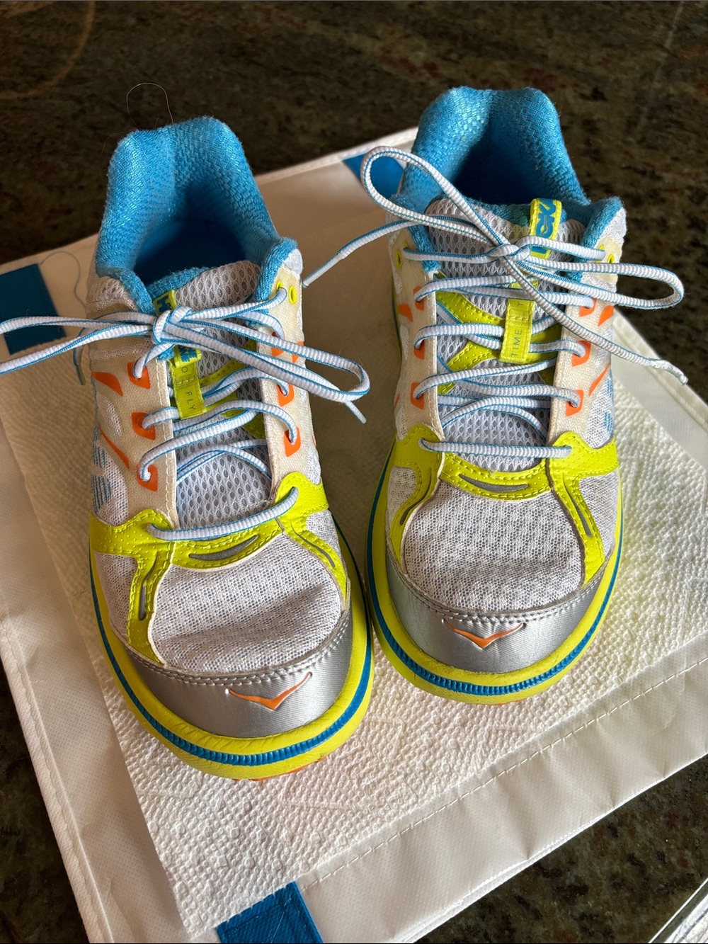 Hoka Women’s Athletic Shoes in Neon Yellow, Blue & Silver